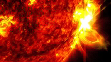A powerful geomagnetic storm could strain the power grid as the recovery process continues following two major hurricanes.
