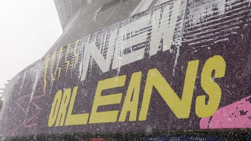 The NBA postpones the Bucks-Pelicans game because of a record snowfall in New Orleans.